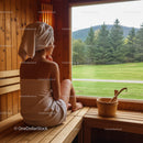 Woman Relaxing in Sauna with Mountain and Green Landscape View