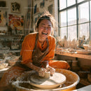 Joyful Woman Creating Handmade Pottery in Artistic Studio