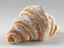 Golden Croissant Dusting of Powdered Sugar in Close-Up