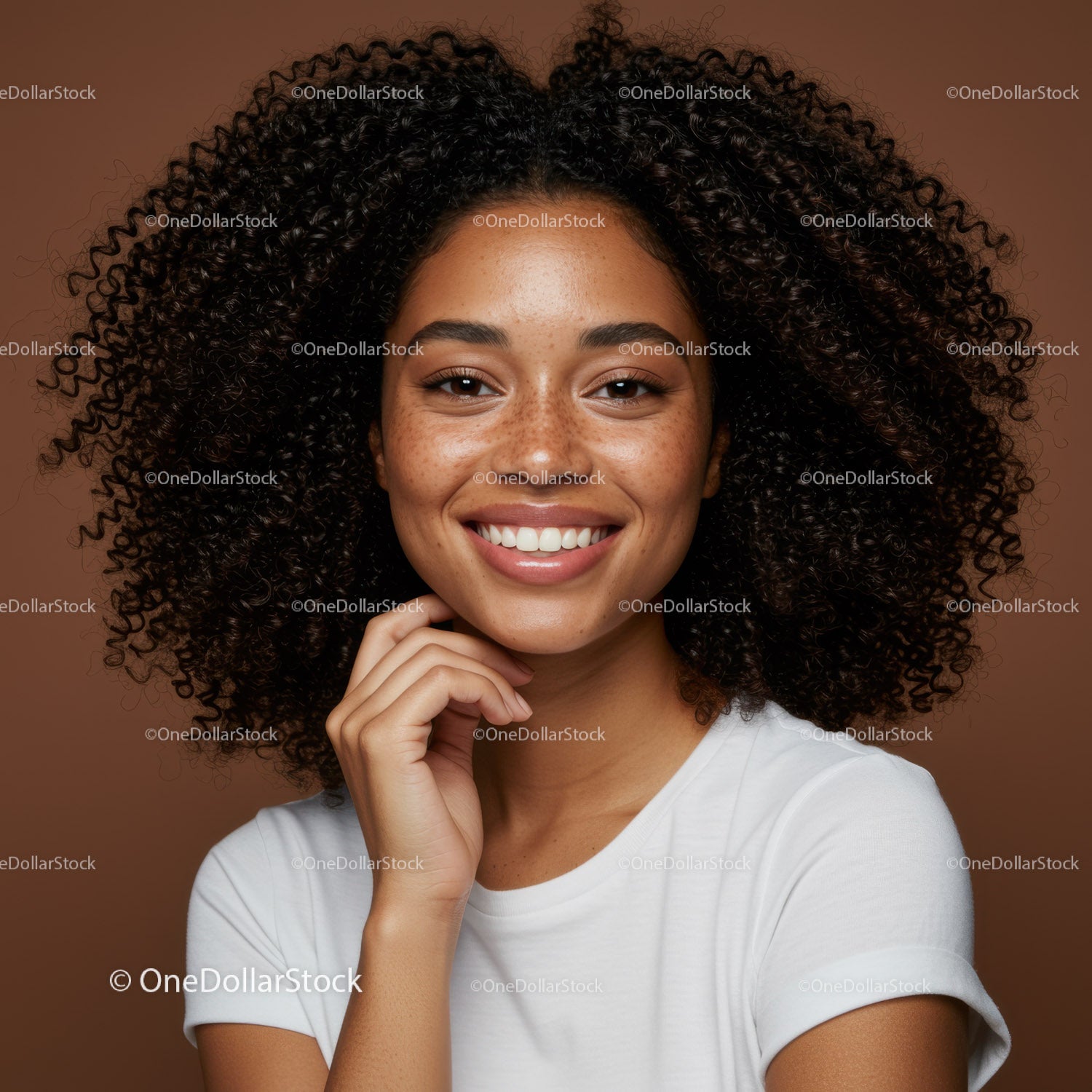 Young Woman with Curly Hair and Bright Smile in Casual Portrait