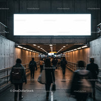 Commuters walking through urban underground passageway