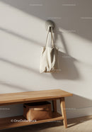 Minimalist Home Interior with Beige Tote Bag and Wooden Bench