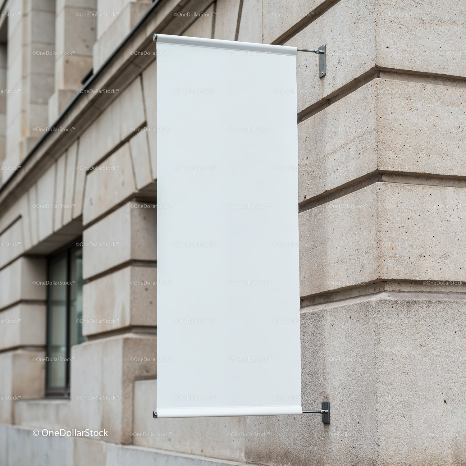 Blank vertical banner on stone building exterior wall