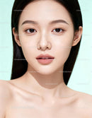 Close up of serene young woman with flawless skin