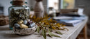 Herbal Supplements and Natural Medicine Capsules on a Rustic Table