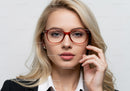 Elegant Blonde Woman Wearing Stylish Red Glasses for Fashion and Style