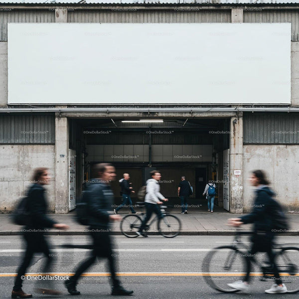Blurred pedestrians and cyclists moving past urban garage entrance JPG Mockup Image