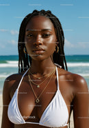 Elegant Woman in White Bikini with Jewelry on Sunny Beach
