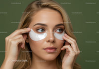 Young Woman Applying Under Eye Patches for Skin Care Treatment