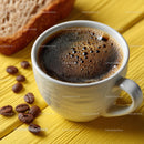Delicious Coffee in a White Cup with Roasted Beans on Wooden Plate