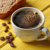 Delicious Coffee in a White Cup with Roasted Beans on Wooden Plate