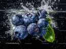 Fresh Blueberries Splashing in Water with Vibrant and Juicy Appearance