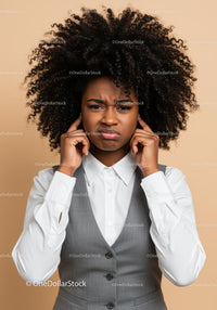 Frustrated Woman Covering Ears with Annoyed Expression