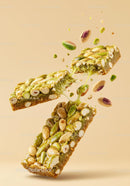 Sticky Pistachio Nut Bar Breaking with Scattered Nuts