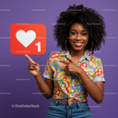 Cheerful Woman Holding Love Symbol in Colorful Outfit
