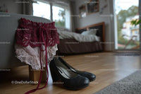 Chic Black Heels and a Red Lace Dress in a Cozy Bedroom Setting