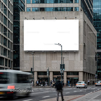 Urban street scene with blank billboard on city building