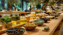 Herbal tea jars and artisanal pottery on rustic wooden display