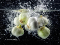 Fresh White Onions Splashing Underwater in Water Splash Scene