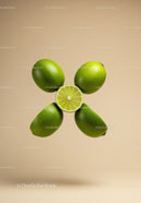 Fresh limes creatively arranged on beige background