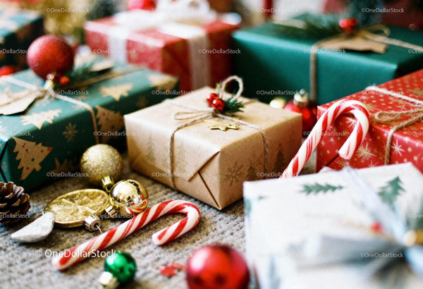 Festive Christmas gifts with ornaments and candy canes