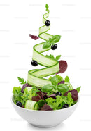 Fresh garden salad with cucumber ribbon and black olives