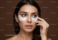 Young Woman Applying Under-Eye Patches for Skincare Routine