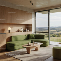Modern living room with green sofa and scenic view
