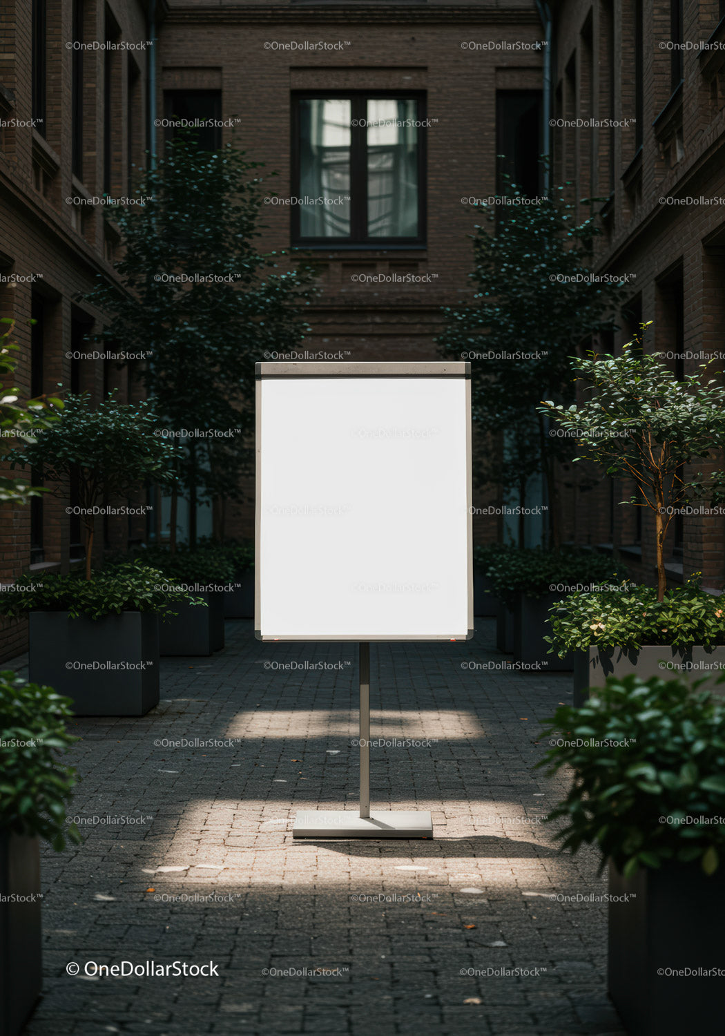 Blank white board in urban courtyard with plants