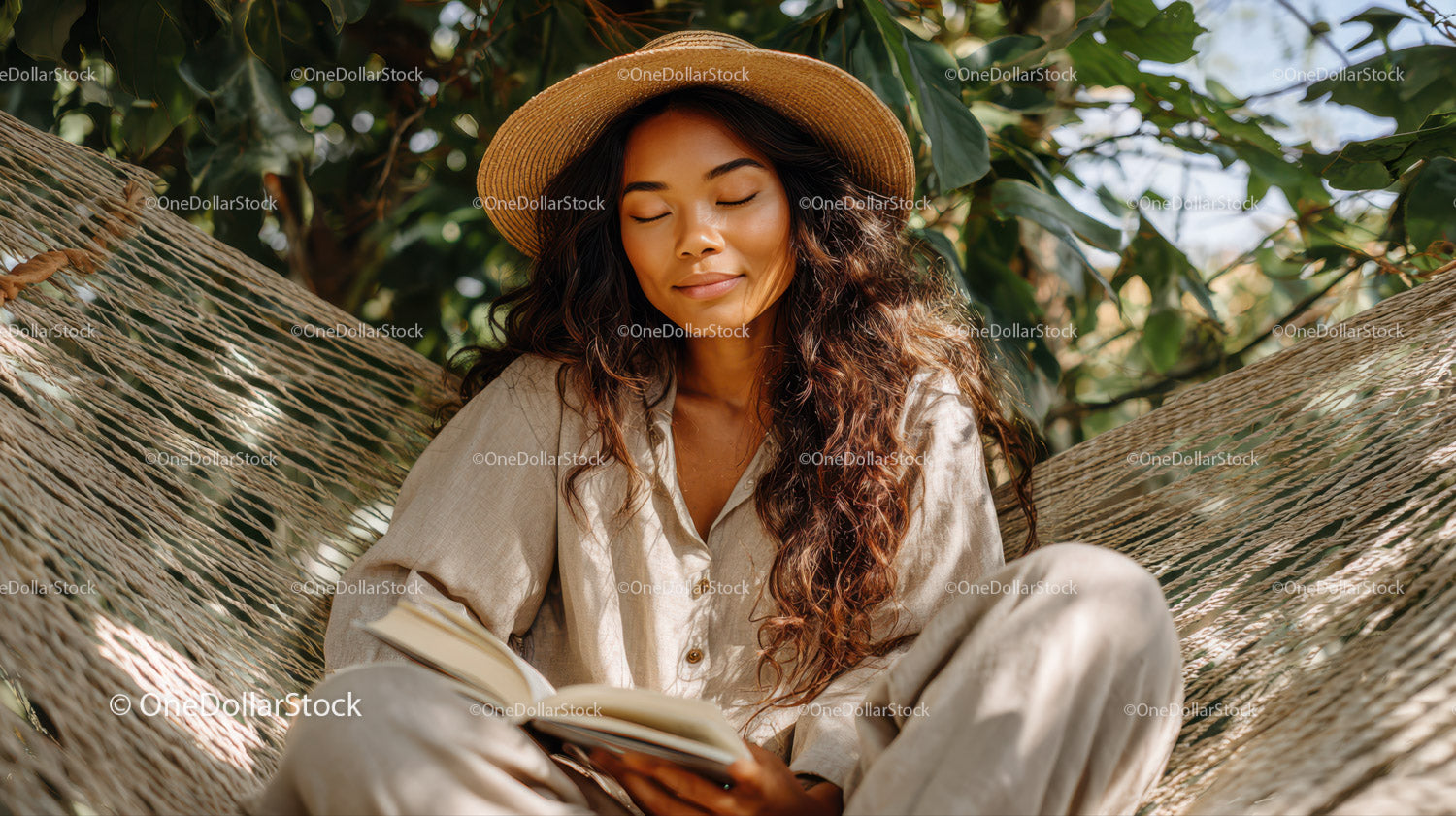 Relaxed Woman in Straw Hat Reading Book in Lush Green Garden