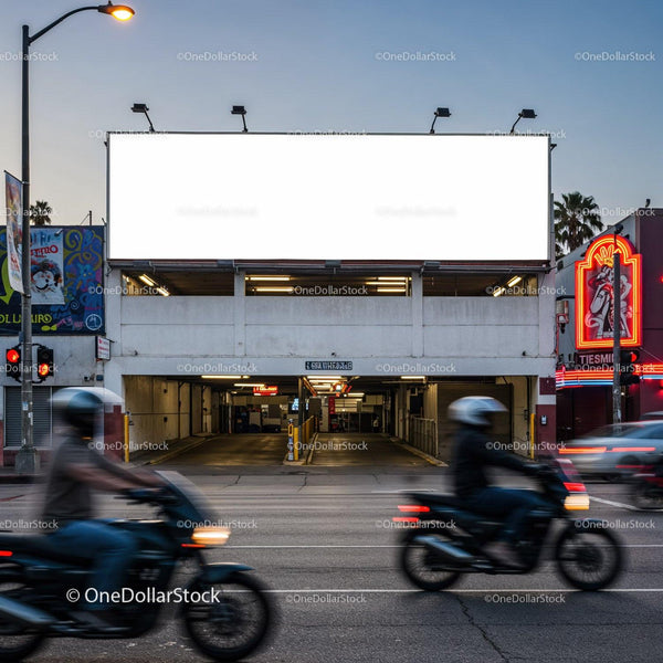 Motorcyclists passing by urban parking garage at dusk JPG Mockup Image