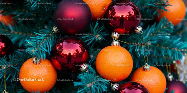 Fresh Oranges and Shiny Baubles on Christmas Tree