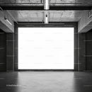 Empty Industrial Space with Large Backlit Concrete Wall