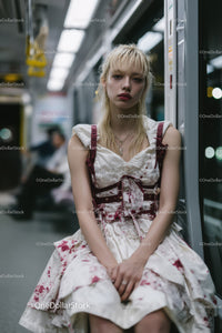 Urban Night Portrait of Young Woman in Bloodstained Dress on Bus