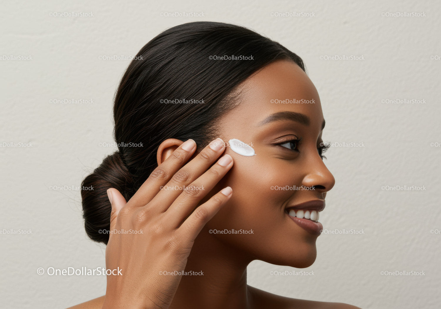 Woman Applying Face Cream for Skincare Routine