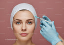 Young Woman Receiving Facial Cosmetic Injection for Rejuvenation
