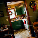 Cozy Kitchen Decorated with Christmas Wreaths and Lights
