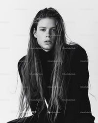 Stylish Young Male Model with Long Hair in Black and White Portrait