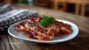 Crispy Bacon Slices with Parsley Garnish on Wooden Table