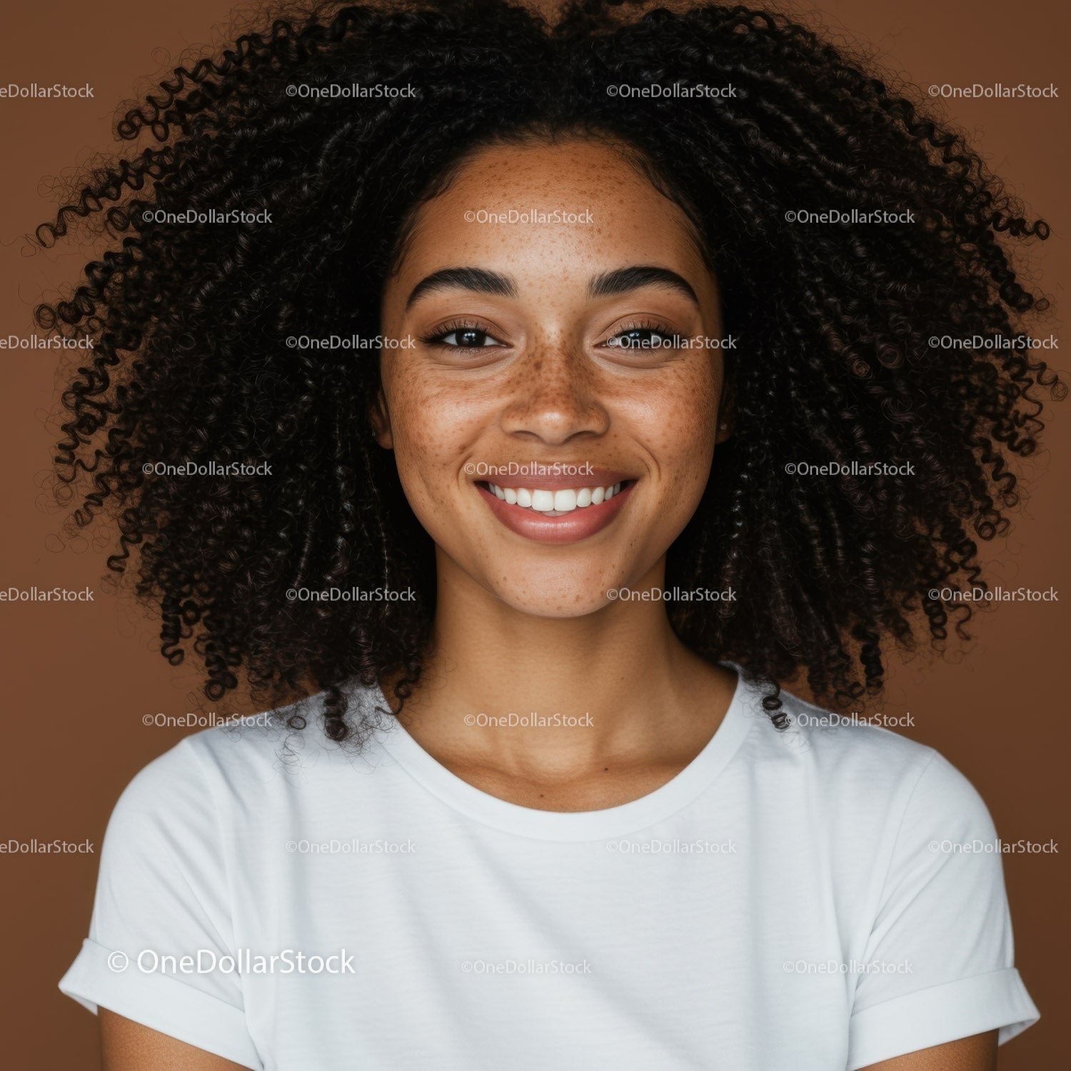 Portrait of a Smiling Woman with Curly Hair and Freckles