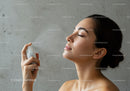 Woman Using Refreshing Facial Mist for Hydration and Skin Care