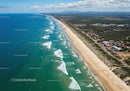 Aerial View of Turquoise Ocean Waves and Sandy Coastline