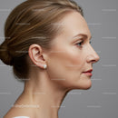 Elegant Mature Woman Profile with Flawless Skin and Pearl Earring