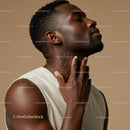 Close-up Portrait of Black Man with Moisturized Skin and Confident Expression