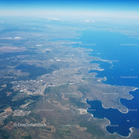 Scenic Aerial View of Coastal City with Lakes and Green Spaces