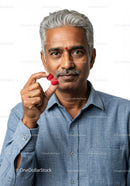 Mature Indian Man with Gray Hair Holding Raspberries for Healthy Lifestyle