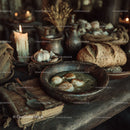 Rustic Kitchen Scene with Dried Herbs Garlic Bread and Candle Light