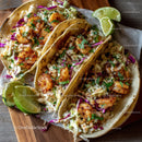 Grilled Fish Tacos with Shredded Cabbage and Lime Wedges