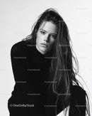 Black and White Portrait of Young Woman with Long Hair in Artistic Style