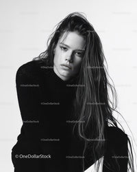 Black and White Portrait of Young Woman with Long Hair in Artistic Style